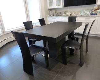 Contemporary designer dining table with 6 designer leather chairs