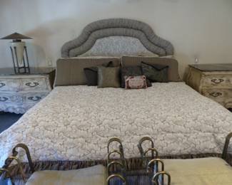 King size upholstered bed with box spring/mattress, bedding & accent pillows, pair of marble top Bombay chests, pair of iron benches