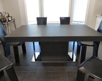 Contemporary designer dining table with 6 designer leather chairs