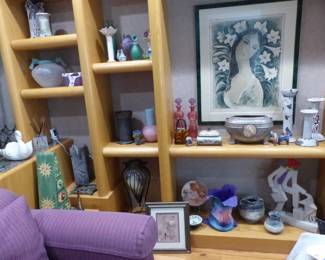 Sofas, chairs, bric-a-brac, framed pictures and posters