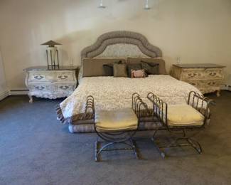 King size upholstered bed with box spring & mattress, bedding & accent pillows, pair of marble top Bombay chests, pair of iron benches