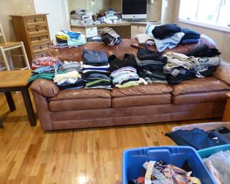 Leather sleep sofa, side table, clothing