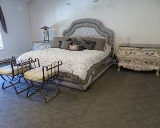 King size upholstered bed with box spring/mattress, bedding & accent pillows, pair of marble top Bombay chests, pair of iron benches