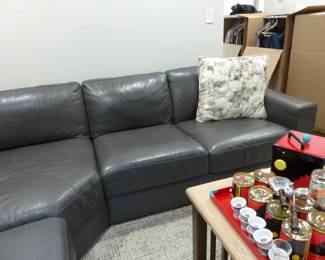 Chateau d'Ax Italian leather sectional sofa, coffee table with slide out benches