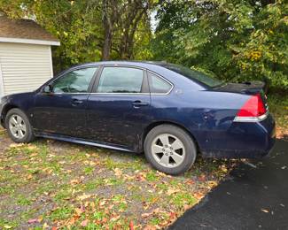 Chevy Impala, 10006 miles, bucket seats, automatic, 4 door