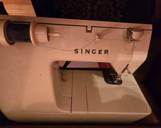 Singer sewing machine with cabinet