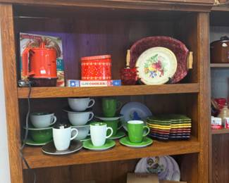 Vintage kitchen, dishes, canisters of all types and colors, fall leaf plates in multiple colors.