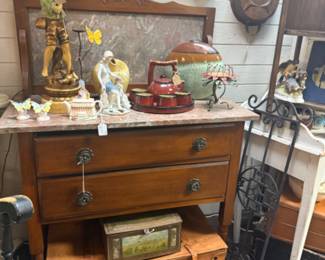 Antique wooden dresser with a marble top
