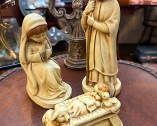 Vintage 3-piece Nativity set by Lund's Lites. Includes figurines of Mary, Joseph and the baby Jesus in a manger with a lamb.