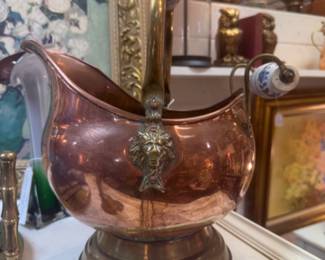 Antique copper and brass coal scuttle with Delft porcelain handles. 