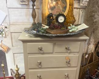 Vintage short dresser, antique framed art, brass candlesticks, clock, old books