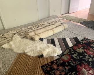 Loads of rugs in two upstairs bedrooms