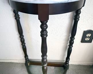 Half-moon side table with marble top