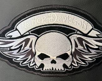 Harley emblem on back of leather jacket