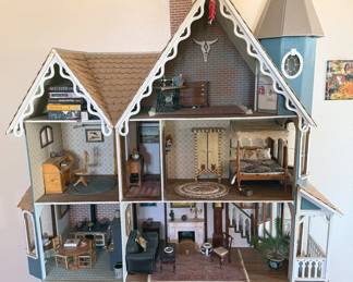 Collector’s dollhouse with miniature furnishings