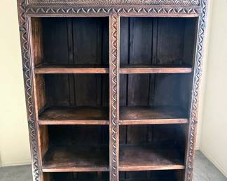 Carved wooden bookcase