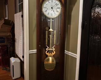 Howard Miller "Ambassador Collection" Grandfather Clock with Mahogany and wood inlays, 3 chime sequences plus night silent mode. Full working order, recently tuned. 80" high