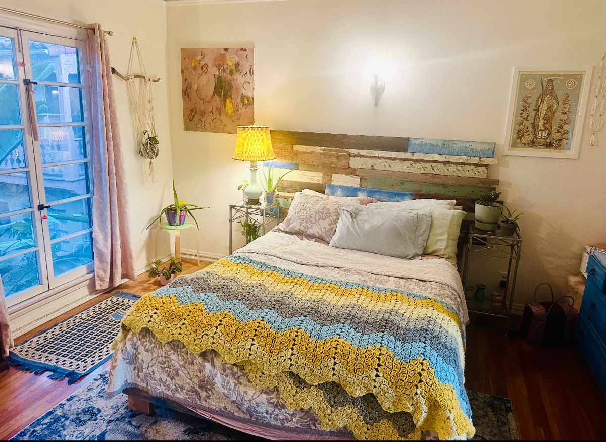 Custom Bed-frame, crafted by a local artist, includes underneath drawers for storage, $900
Large & Small rugs, plants, artworks, & more.
Bedside tables.
Plants.
Art & more!