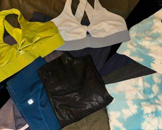 Women’s athletic attire. New & like new, mostly from Fabletics. Large variety, some with tags. $5 each.
