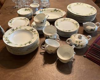 Kent china on dining room table with table covers and 6 chairs