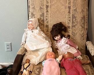 Old chair with old dolls