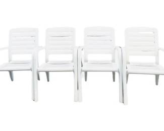 Four Stackable Plastic Outdoor Arm Chairs
