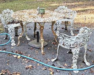 Ornamental iron table and chairs set.