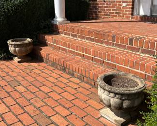 Concrete planters located front of house 