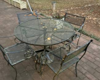Wrought Iron Patio set includes table and 4 chairs 