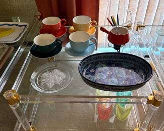 These are crystal glass and Lucite. Incredible tables!