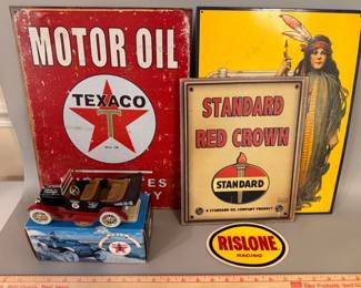 Metal, reproduction signs and model cars throughout the auction