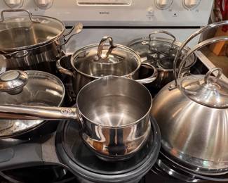 Assorted stainless pots and pans