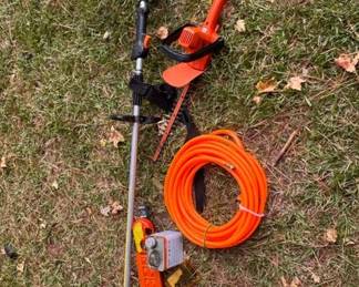 Stihl weedeater with accessories. Black and Decker hedge trimmer. New air compressor hose.