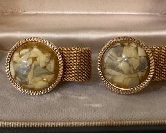 Several pairs of cuff links available