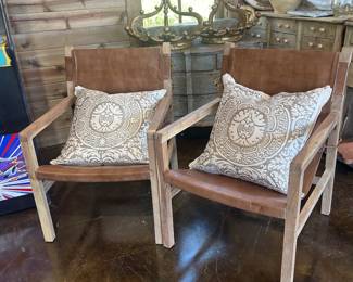 Newer hide chairs and Culp Associates upholstered pillows