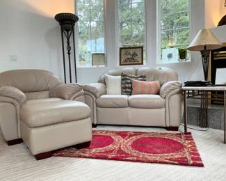 Like new condition Leather couches with Large touchier lamp and Pottery Barn rug