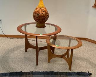 Mid-Century Modern side tables with vibrant mosaic lamp