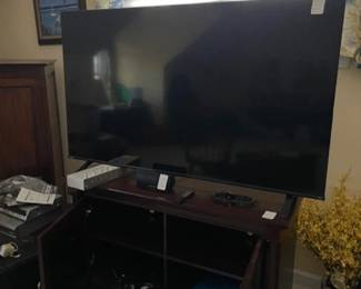 Large screen TV, nice TV stand