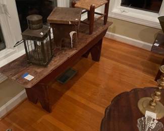 Primitive bench, stools, lantern