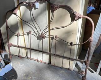 Antique iron headboard- would look pretty for your "Garden Bed"