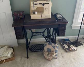 Antique sewing machine cabinet