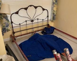 Iron headboard.  Bed frame also available