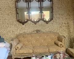 French Provincial-style Sofa with floral pattern