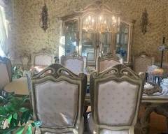 Luxury Dining Room Furniture with a carved wooden frame