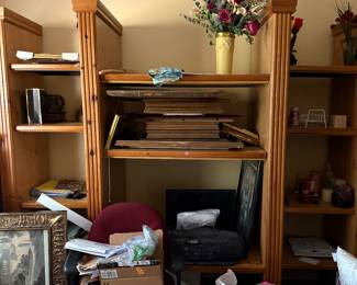Entertainment unit with assortment of pictures, etc