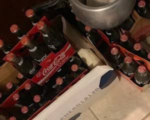 Coca-Cola Bottles in original cartons