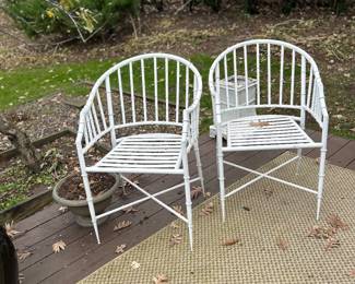 Pair of white steel chairs with cushions