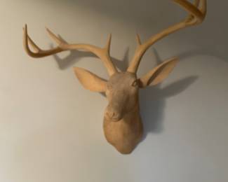 Wooden carved deer head
