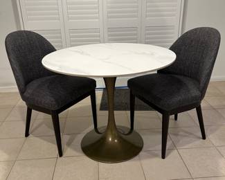 Round faux marble quartz table with 2 Crate & Barrel chairs