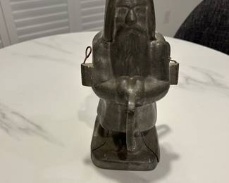 Large collection of antique Victorian ice cream molds - many holiday themed.